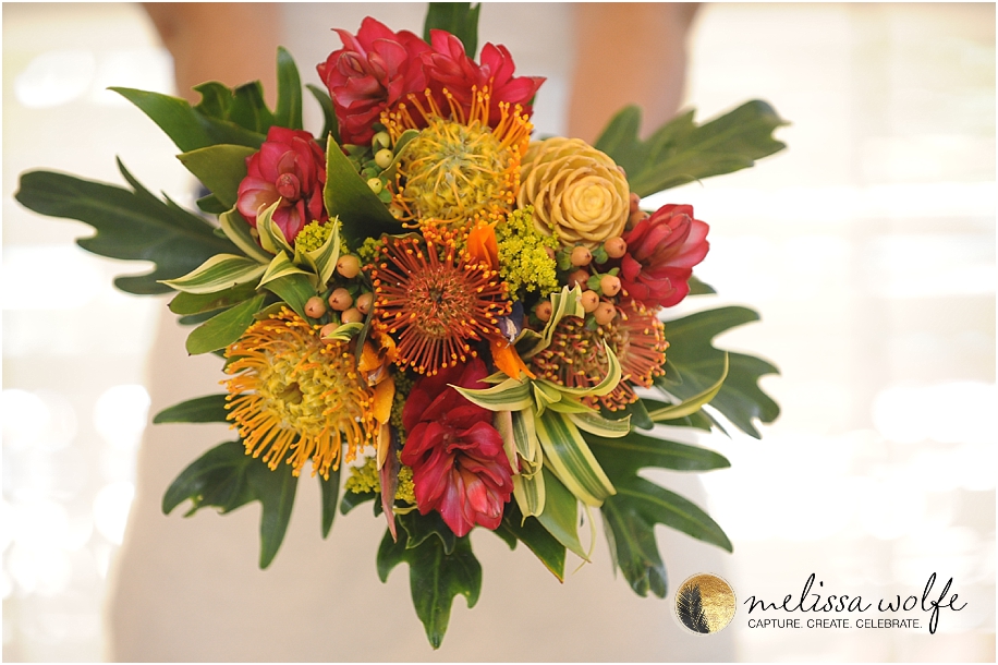 Tropical wedding bouquet photographed by Melissa Wolfe